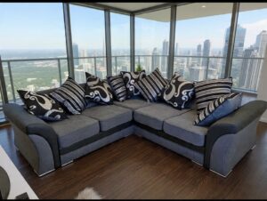 Dino 5 seater sofa with spacious cushioned seating and modern fabric upholstery