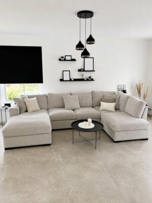 Modern U shape sofa with spacious seating, soft upholstery, and elegant contemporary living room décor.