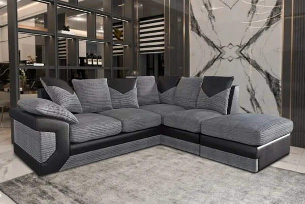 Black-Grey-Corner Dino 5 seater sofa in a modern living room with stylish fabric upholstery and spacious seating