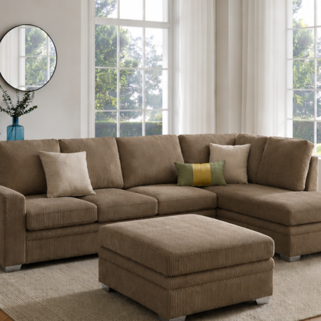 Jumbo cord chaise sofa with soft cord fabric upholstery and spacious L-shaped seating in modern living room
