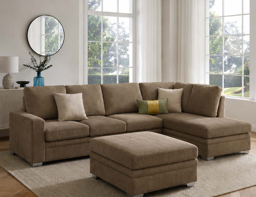 Jumbo cord chaise sofa with soft cord fabric upholstery and spacious L-shaped seating in modern living room